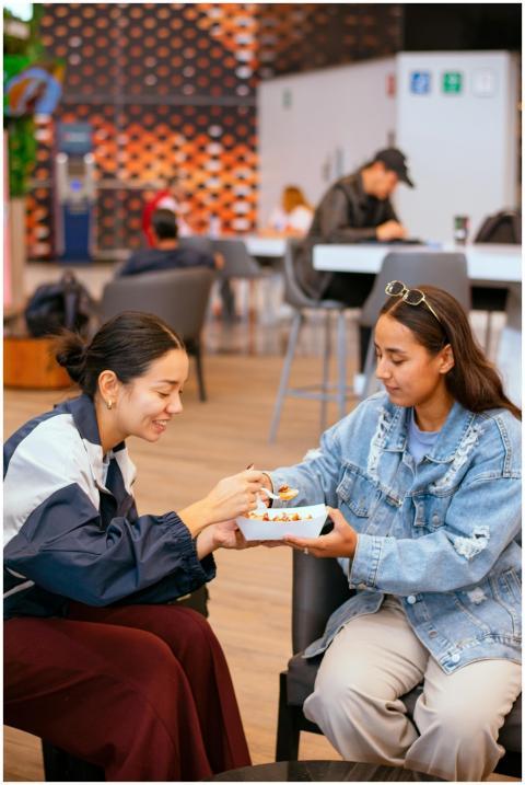 Young Women Sharing Meal