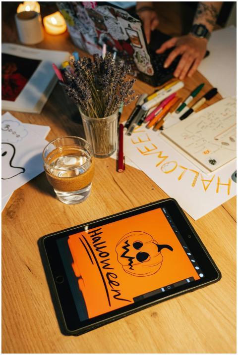 A creative Halloween design featuring a carved pum