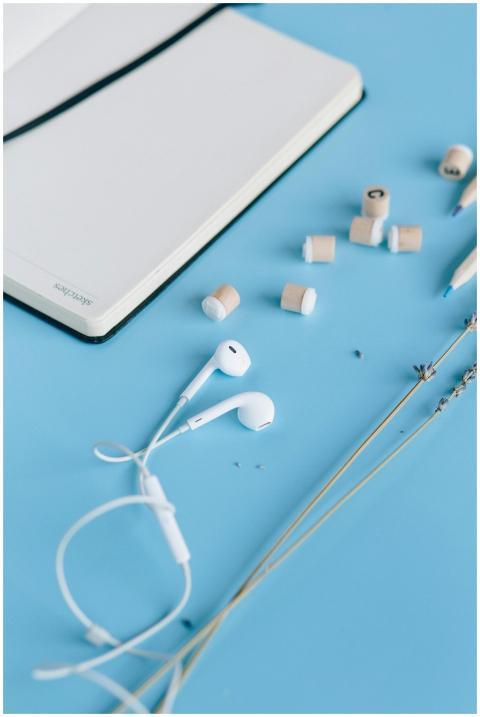 Flat lay of a minimalist workspace with a notebook