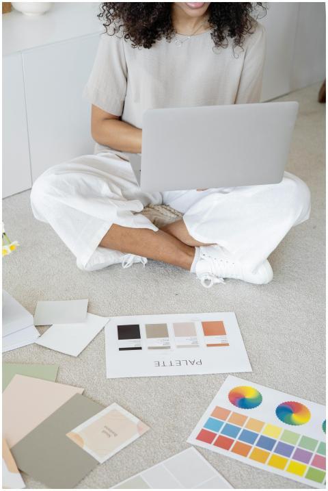 Young woman reviews color palettes for design proj