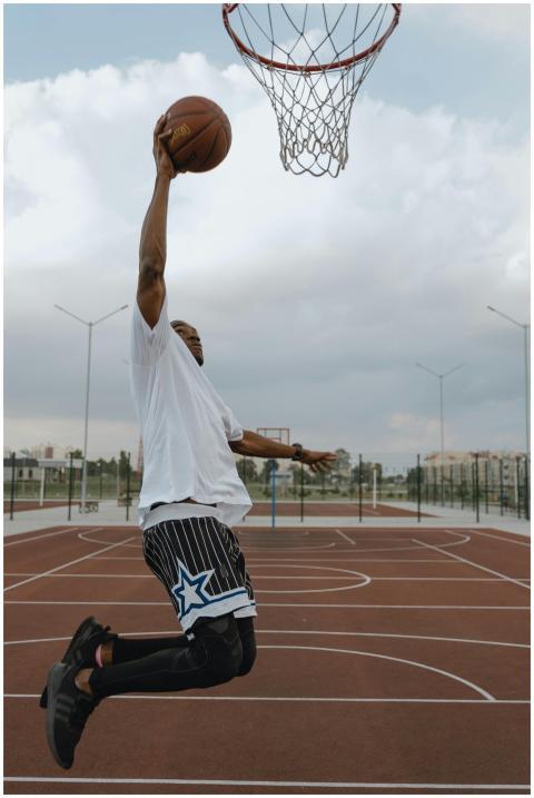 A stunning capture of an athlete in midair dunking