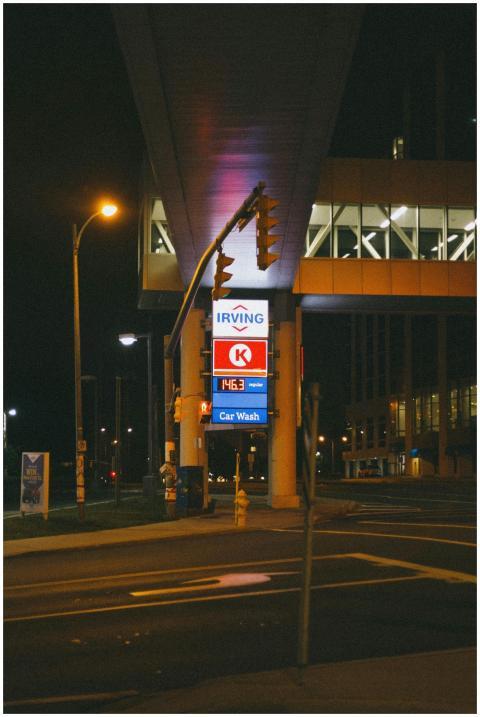 Nighttime view of a city street with illuminated s