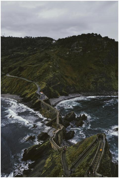 Explore the rugged coastal path leading to San Jua