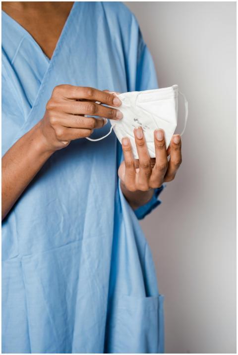 Anonymous African American female nurse wearing bl