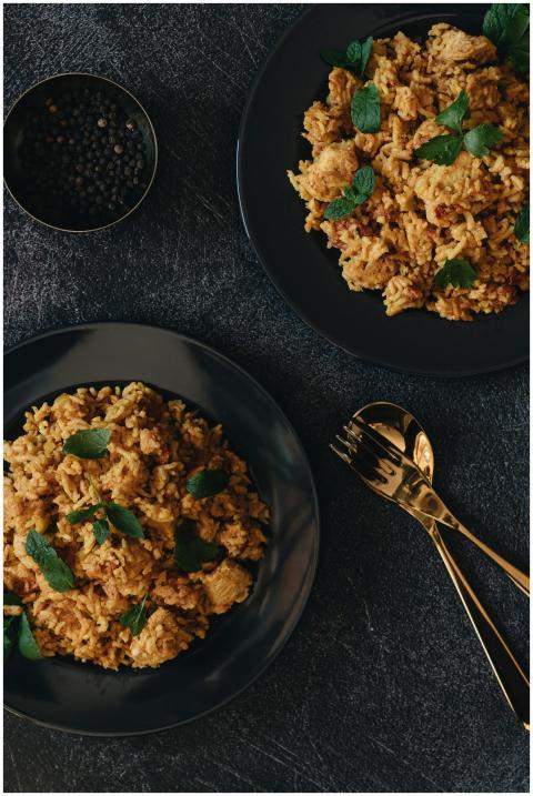 Savor the rich flavors of chicken biryani served e