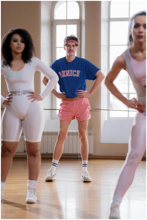 Energetic group exercise class with diverse partic