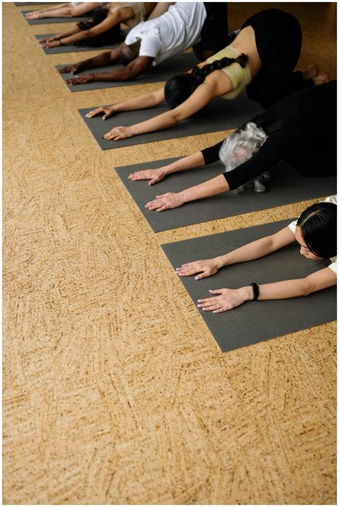 A group of people practicing stretching exercises