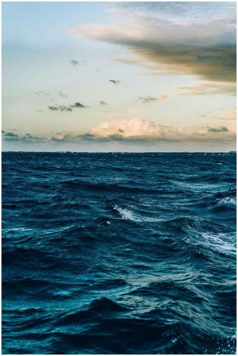 A captivating view of ocean waves under a dramatic