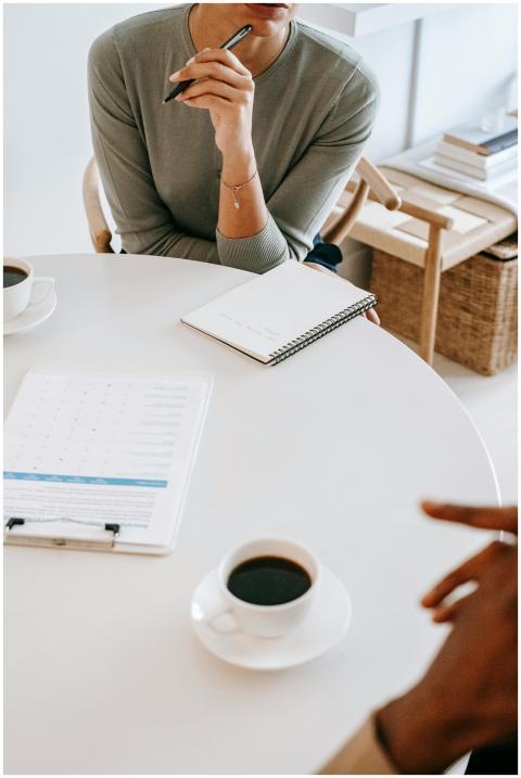 High angle crop professional female psychotherapis