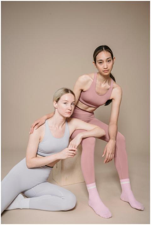 Elegant studio shot of two women in modern activew