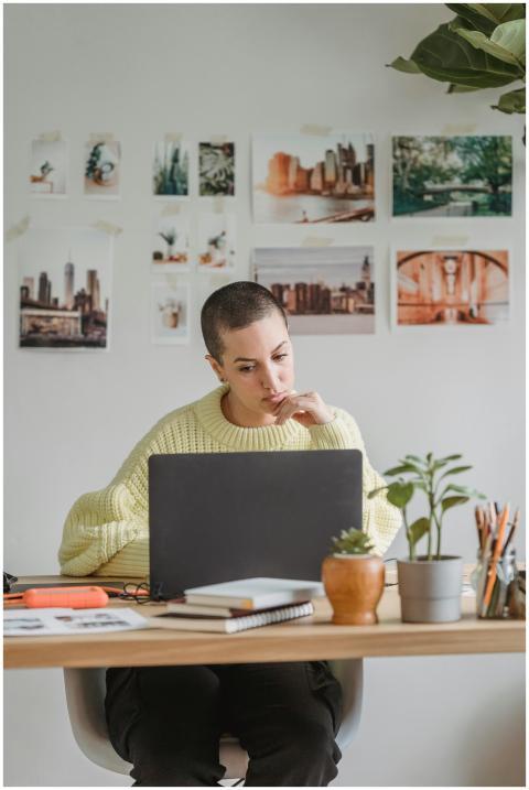 Contemplative young female with short hairstyle us