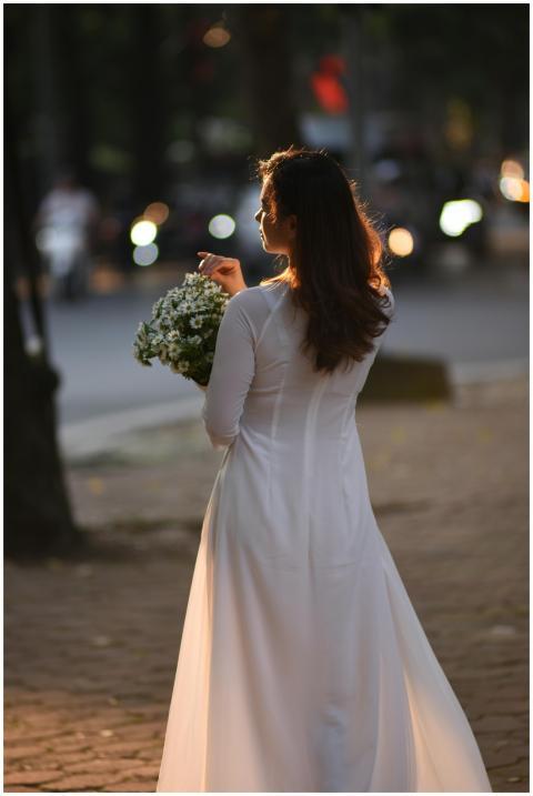 Elegant Woman Holding Flowers