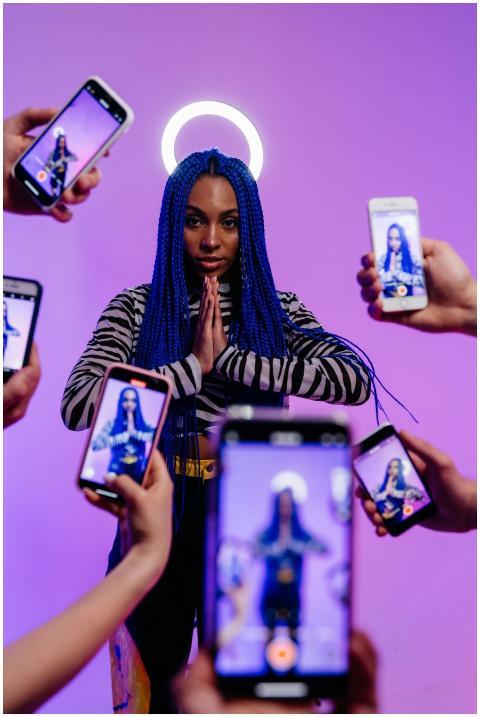 Creative studio shot of a stylish woman with blue