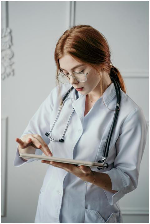Female doctor using a tablet for medical diagnosis