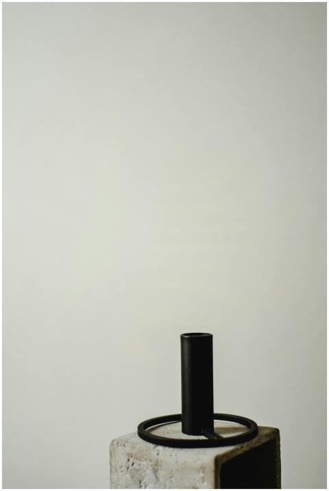 A japandi-style candle holder with a minimalist de