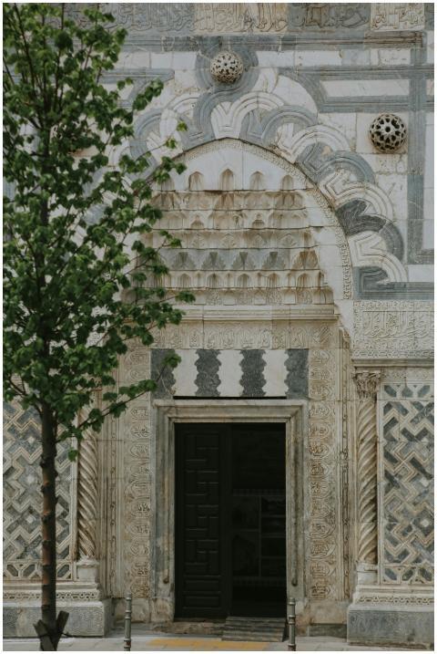 Ancient stone doorway with intricate carvings and