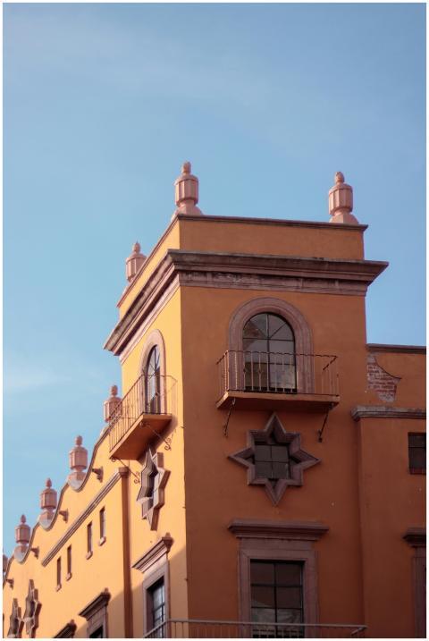 Historic colonial style building with balconies an