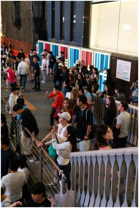 A vibrant urban scene with a diverse crowd of peop