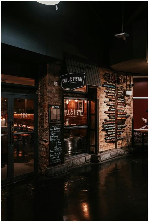Evening view of Cull & Pistol restaurant exterior
