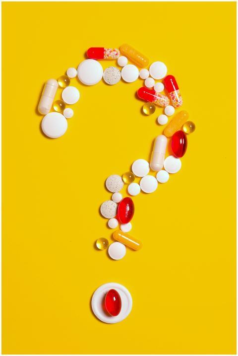 A creative arrangement of various pills forming a