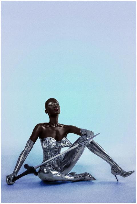 A striking futuristic portrait of a woman in metal