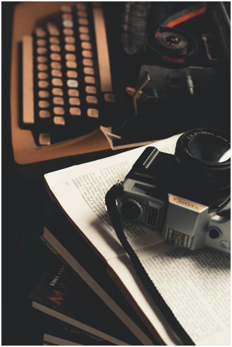 Retro scene featuring a vintage camera and typewri