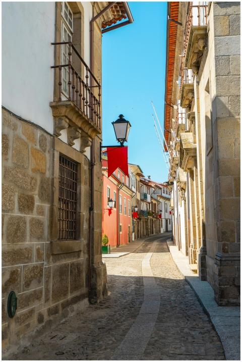 Explore the historic charm of a cobblestone street
