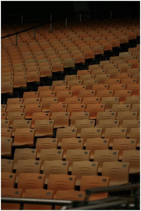 Rows of empty seats in a stadium in Guangzhou, Chi