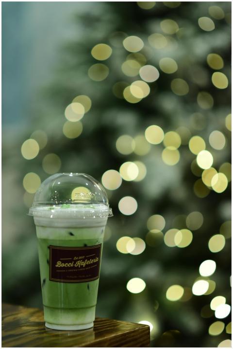 A refreshing iced green tea latte in a cafe during