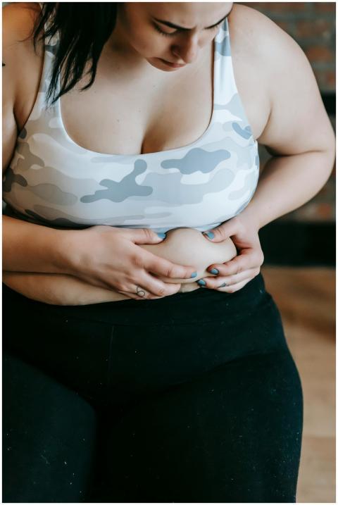 Determined woman in sportswear concentrating on he