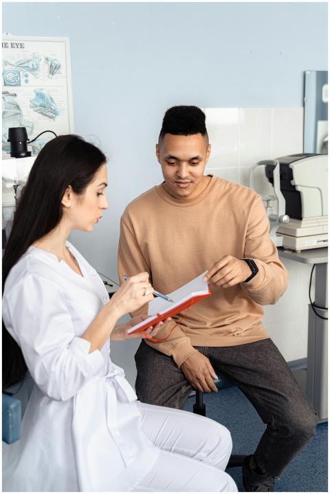 A doctor discusses a diagnosis with a patient in a
