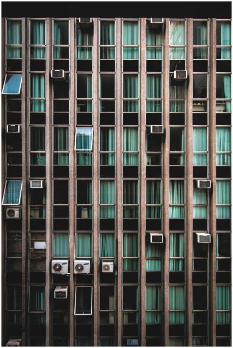 A modern building facade featuring vertical lines