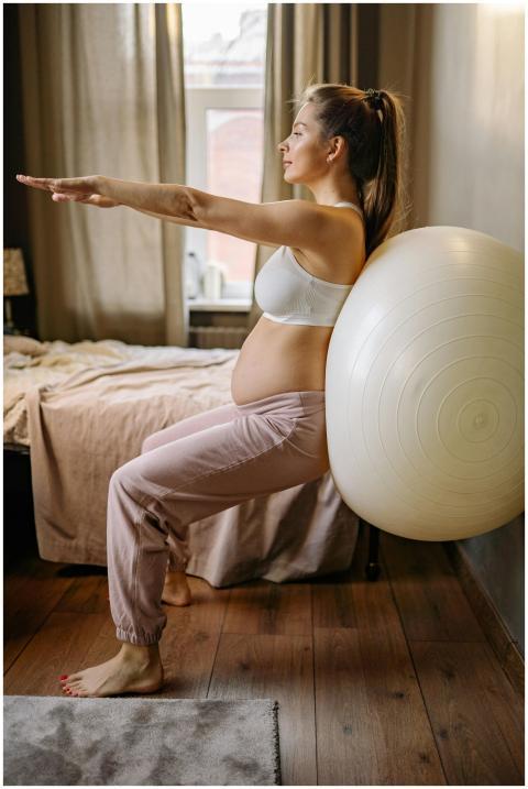 Expectant mother practicing balance exercises with