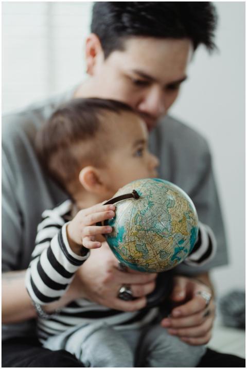 A father and child bonding while exploring a small