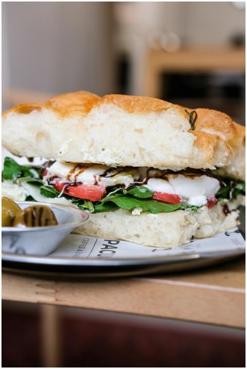 Close-up of a fresh focaccia sandwich with cheese,