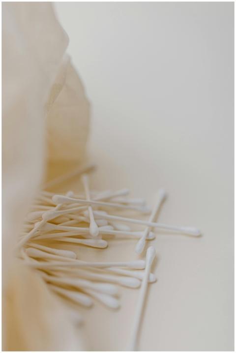 A minimalist composition showing scattered cotton