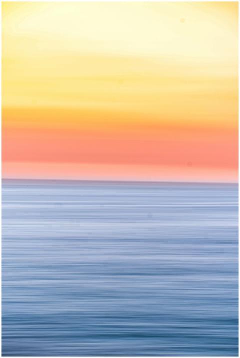 A stunning sunset over Bondi Beach with vibrant co