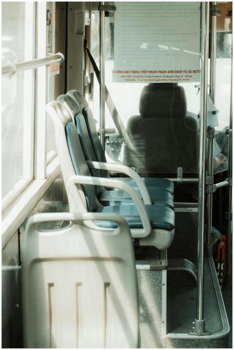 Empty bus interior with sunlight streaming through