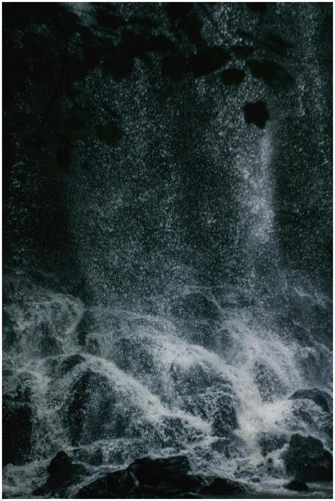 Dramatic waterfall cascading over rocks in Lankara