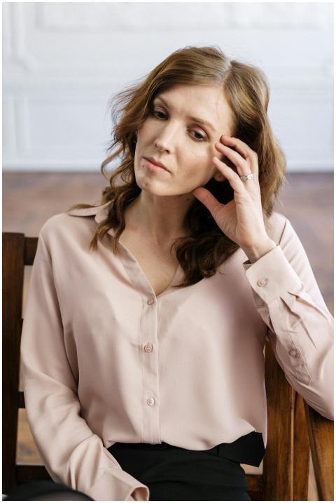 Portrait of a thoughtful woman sitting in an offic