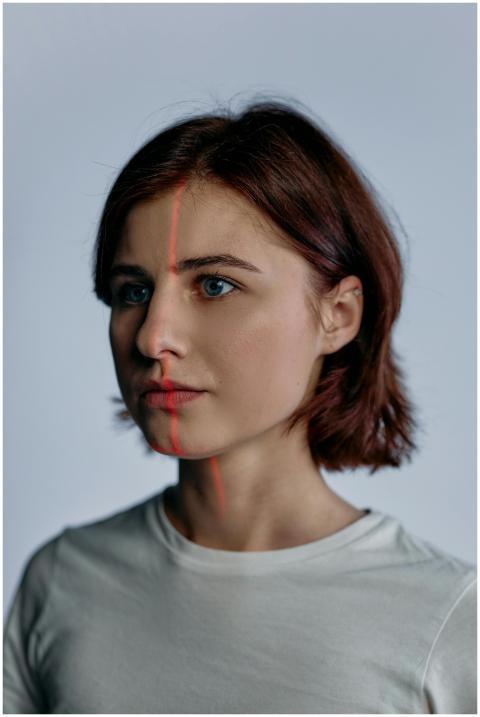A futuristic portrait of a young adult woman with