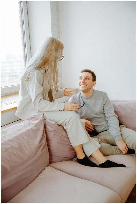 A young couple enjoys a warm conversation while re