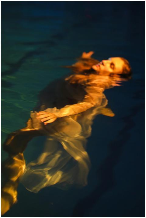 Creative image of a woman floating gracefully in a