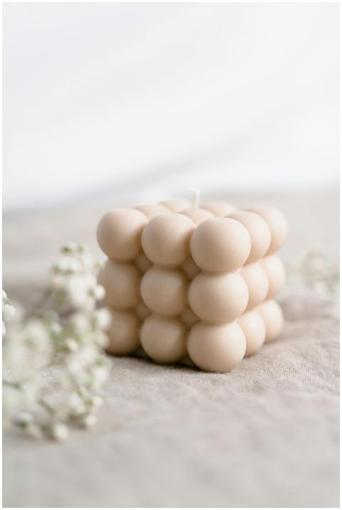 Stylishly crafted bubble candle on fabric with sof