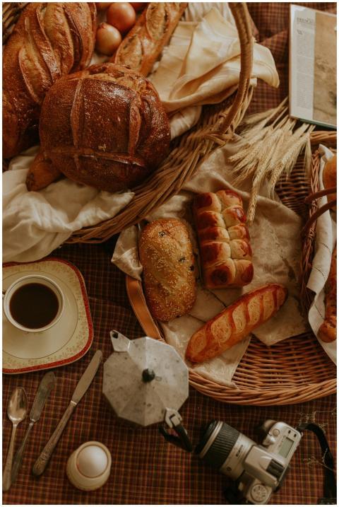 Warm rustic setting with fresh bread, a cup of cof