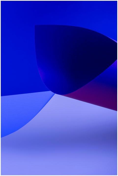 Abstract art with dynamic blue shapes and gradient