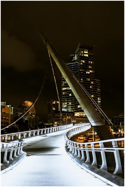 Night view of a modern pedestrian bridge in San Di