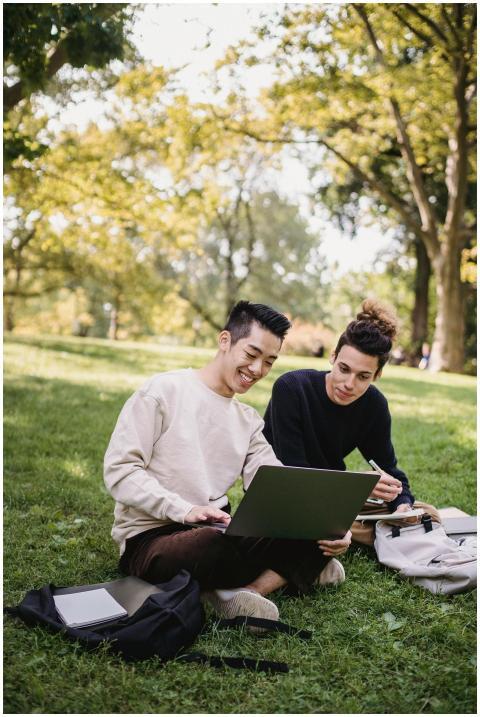 Full length content ethnic male students in casual