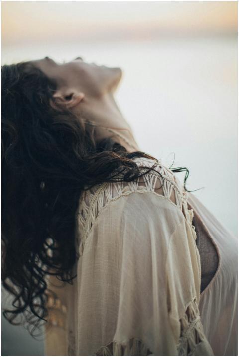 Woman in natural light enjoying a peaceful moment