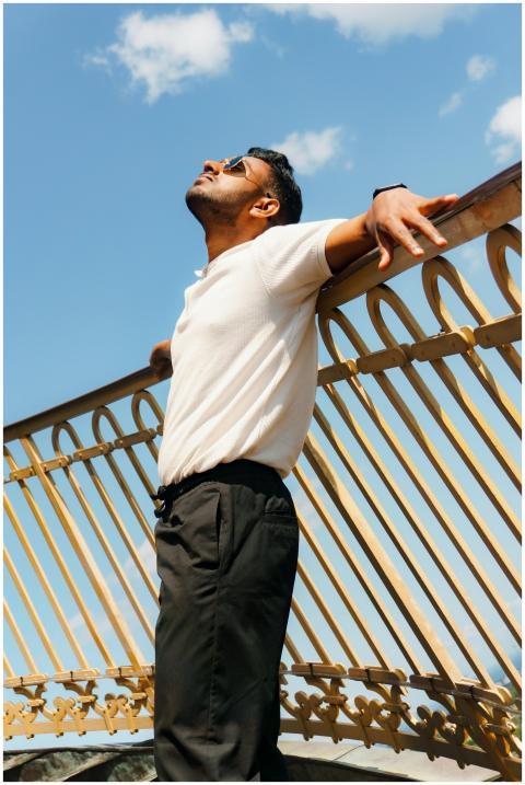 Man Enjoying Sunlight Arms